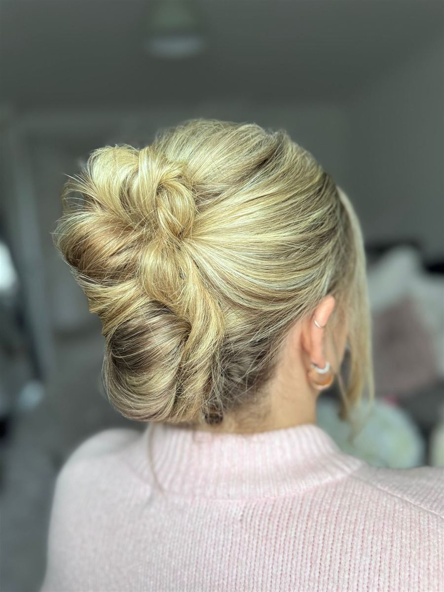 Classic French twist updo with soft texture