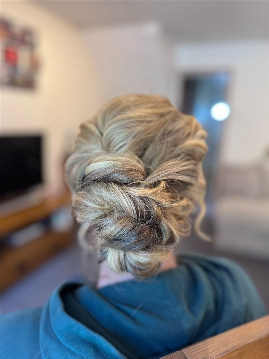 Relaxed textured low bun updo