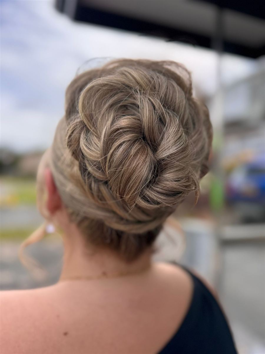 Polished textured updo styled for a special occasion